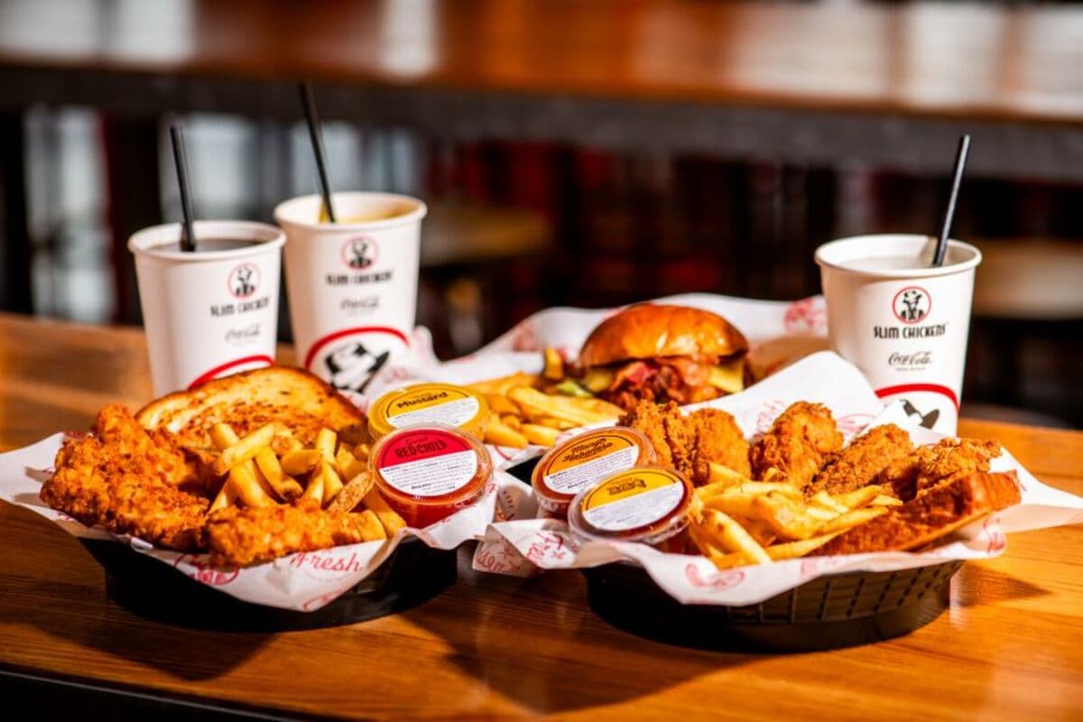 Slim Chickens tenders, wings and fries with drinks
