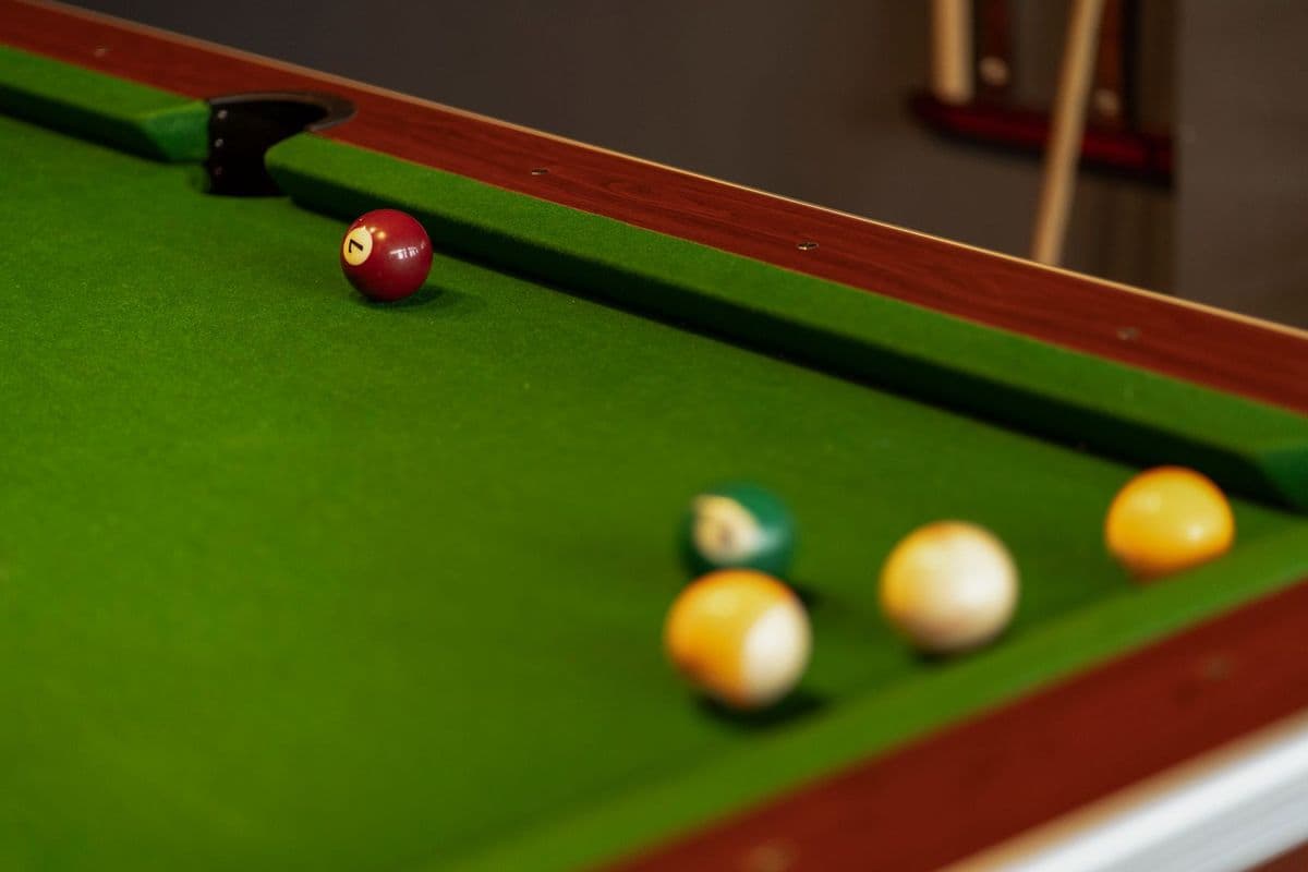 Close-up of snooker balls on green baize
