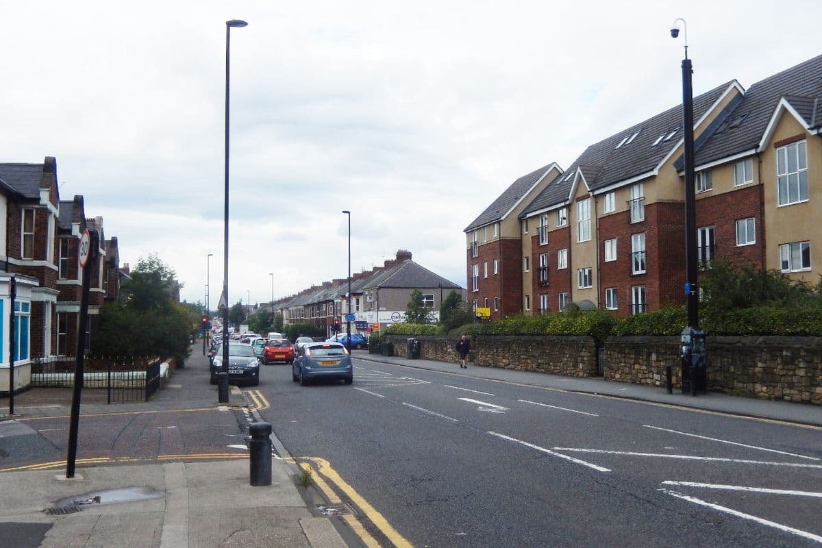 Chillingham Road in Heaton, Newcastle, with terraced houses and shops