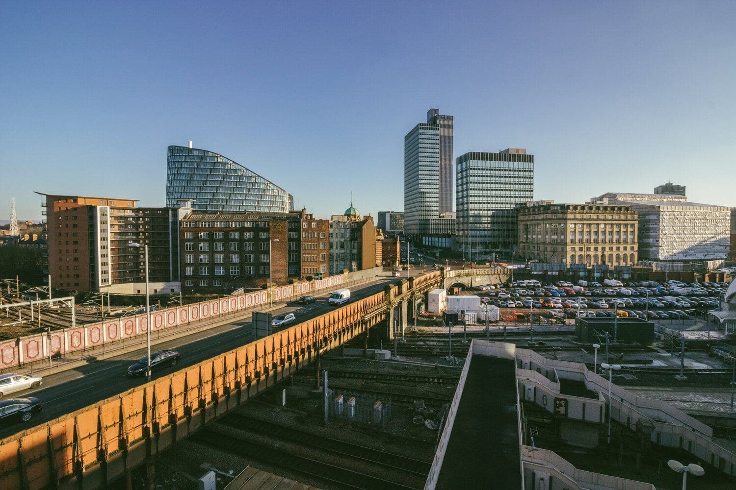 Manchester skyline over the railway viaduct
