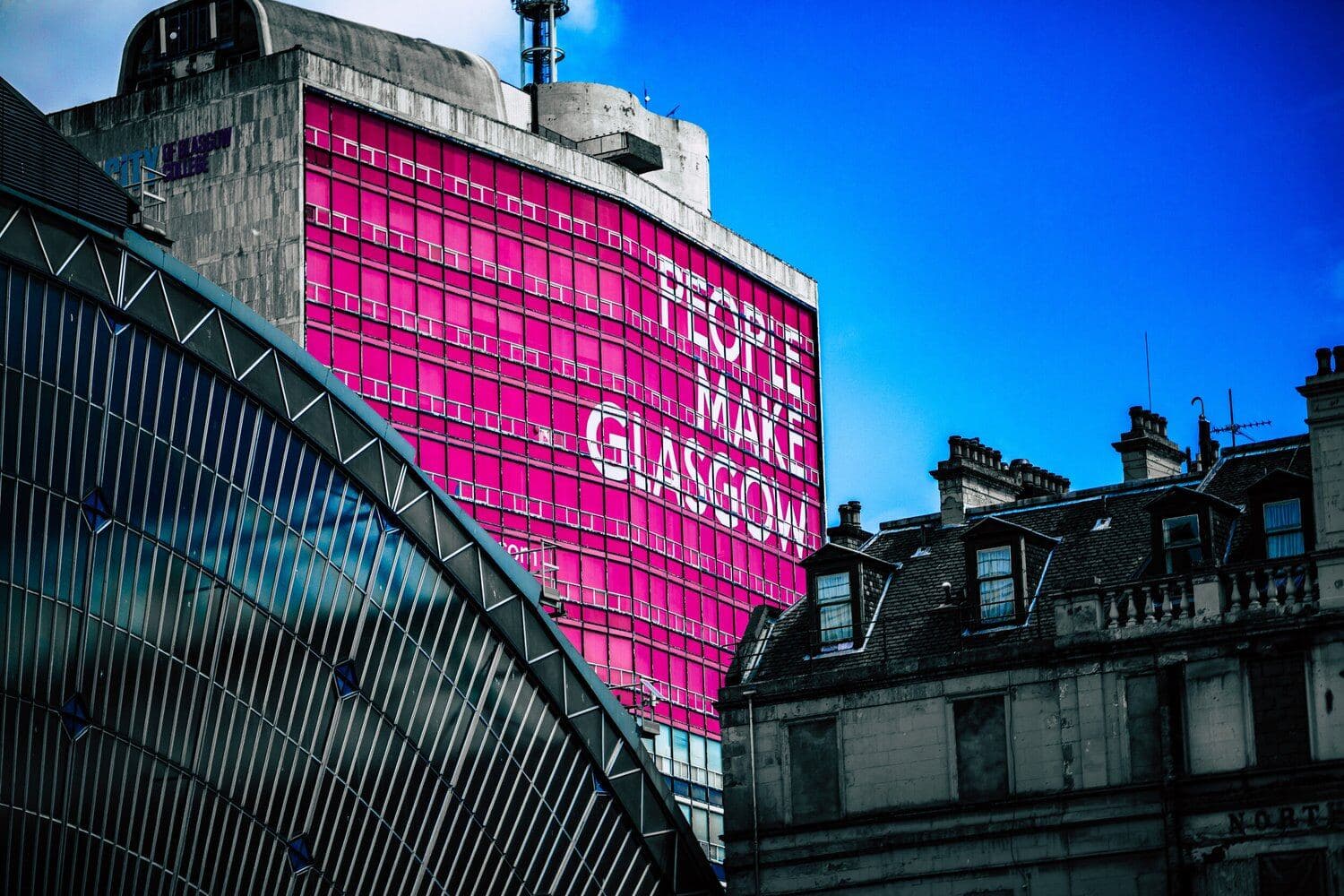 People Make Glasgow sign on a building in Glasgow