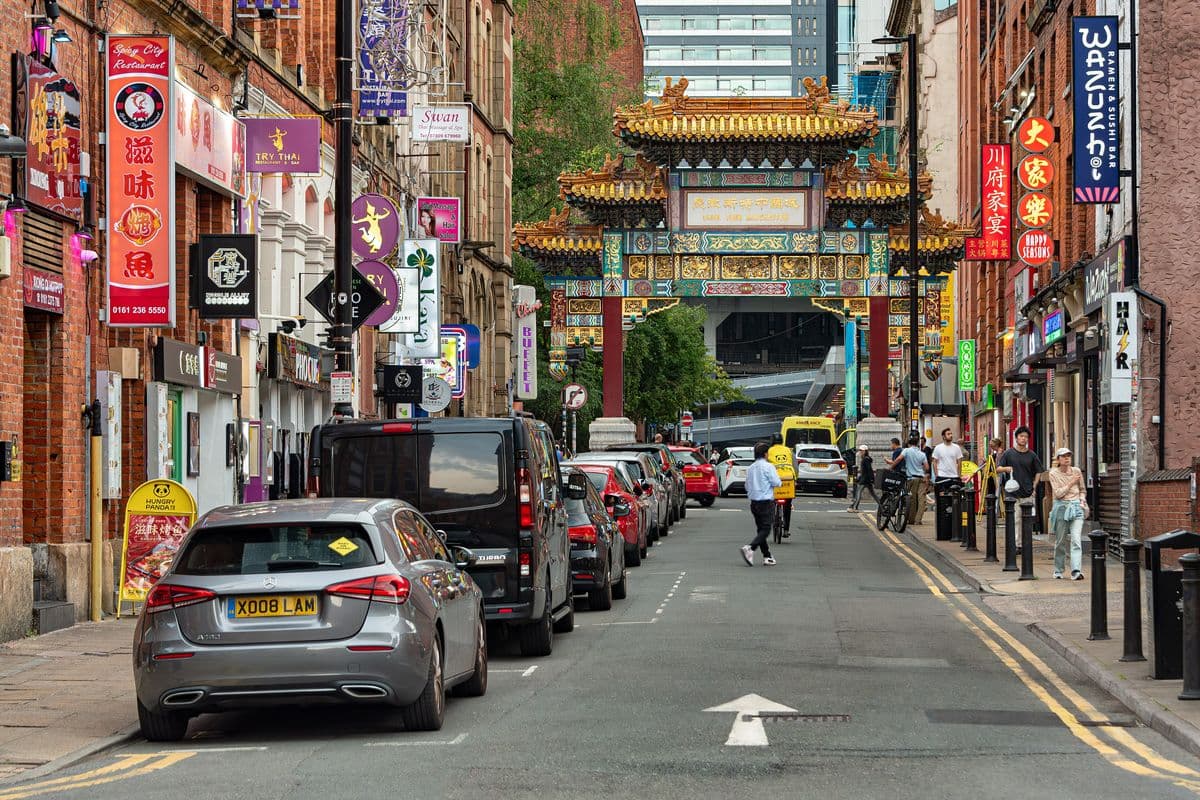 Faulkner Street in Manchester's Chinatown with the Chinese arch and restaurant signs