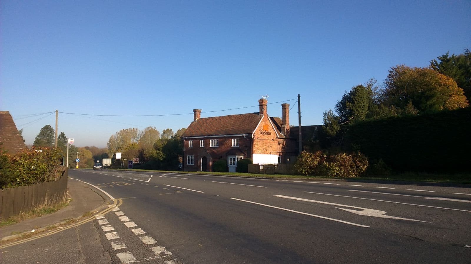 A Beefeater restaurant building set back from a main road
