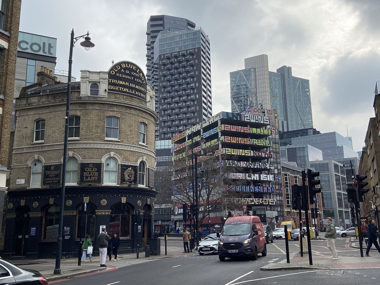 Curtain Road in Shoreditch, with City towers behind
