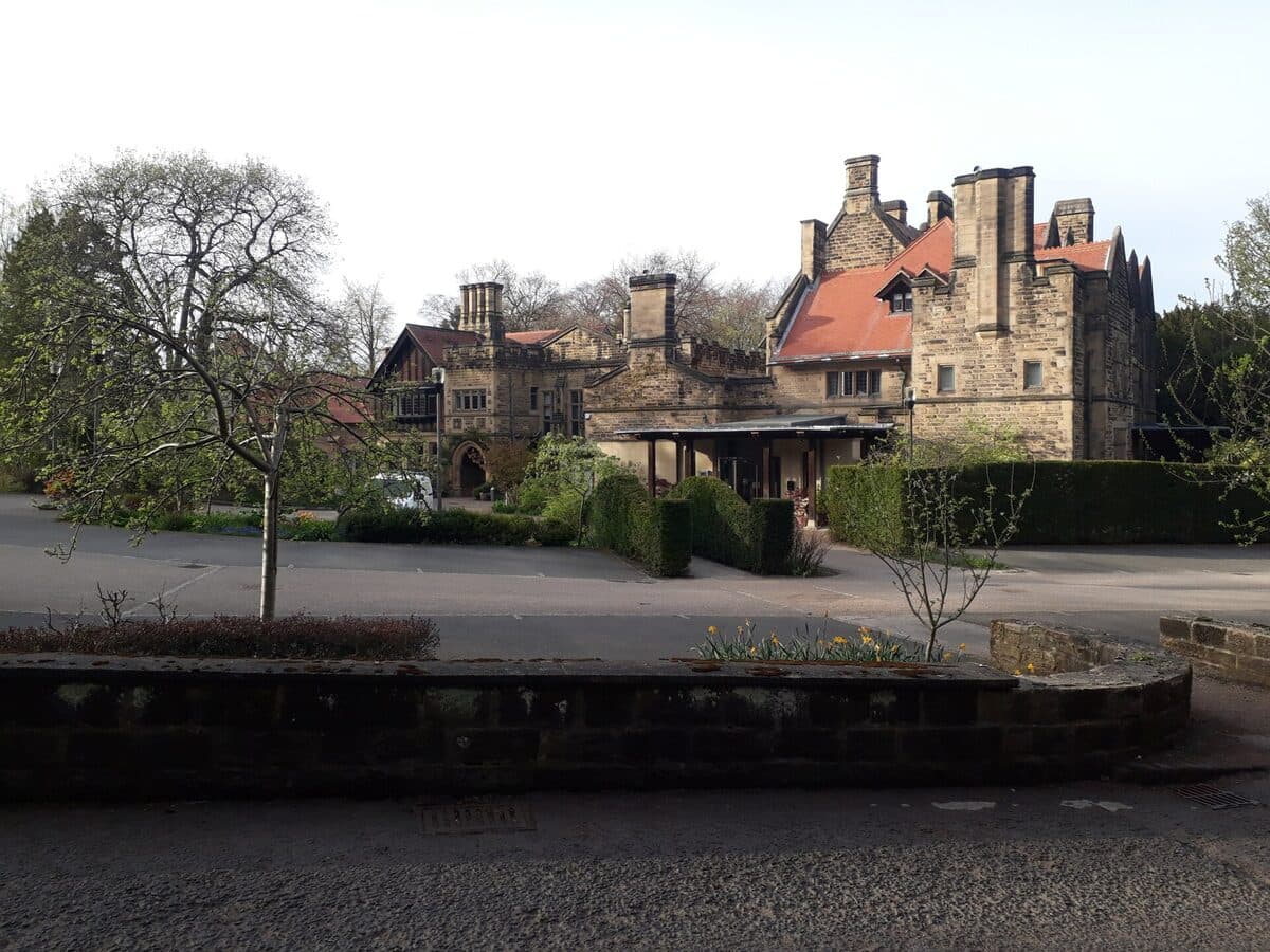 Jesmond Dene House hotel seen across its grounds in Newcastle