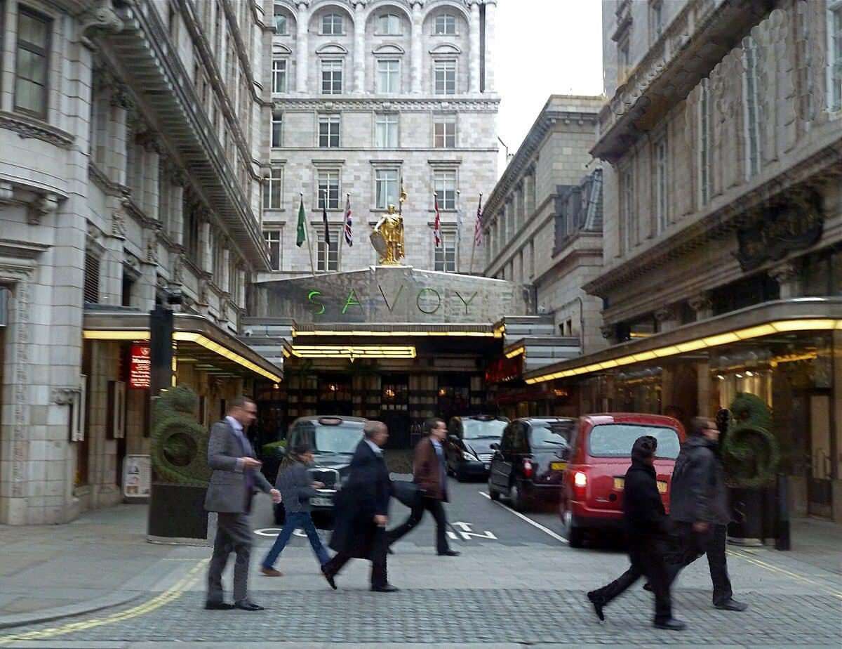 The illuminated entrance canopy of the Savoy hotel in London