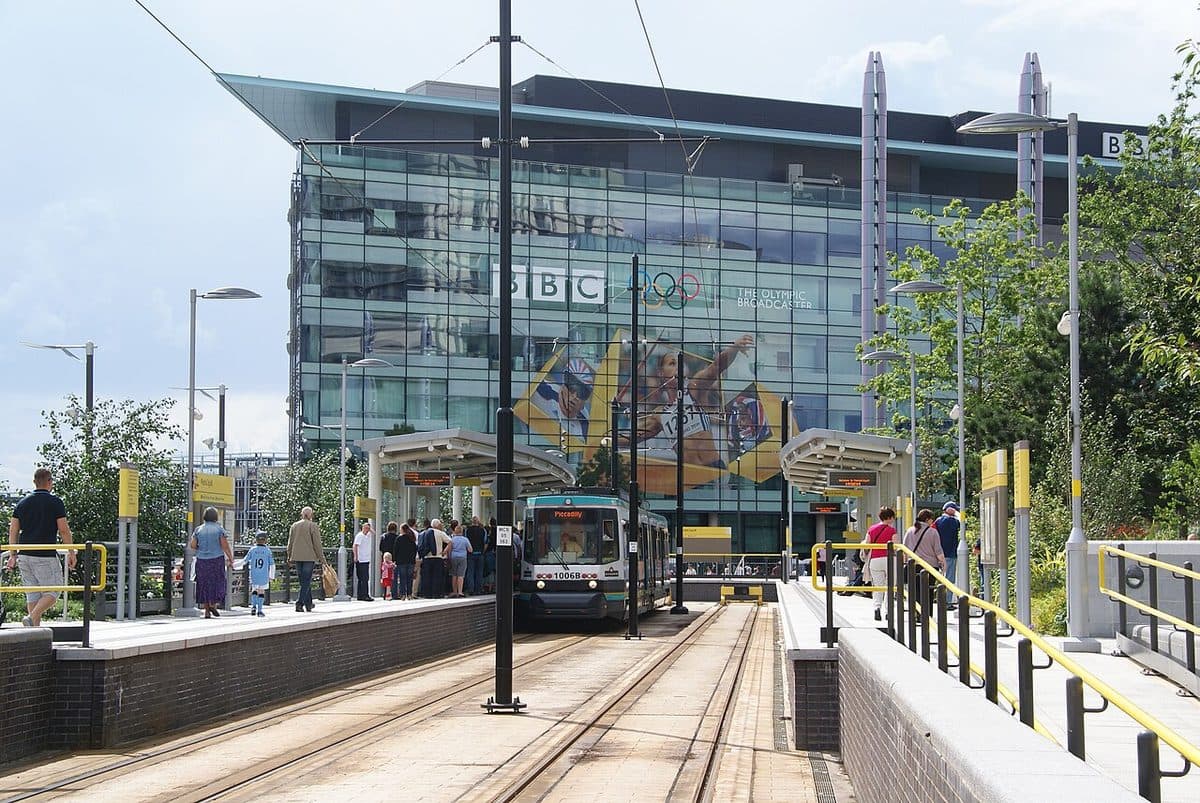 A tram at the MediaCityUK Metrolink stop in Salford