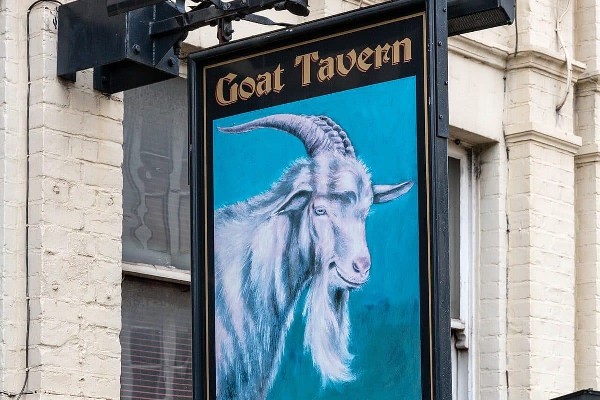 The painted sign of the Goat Tavern pub on Kensington High Street
