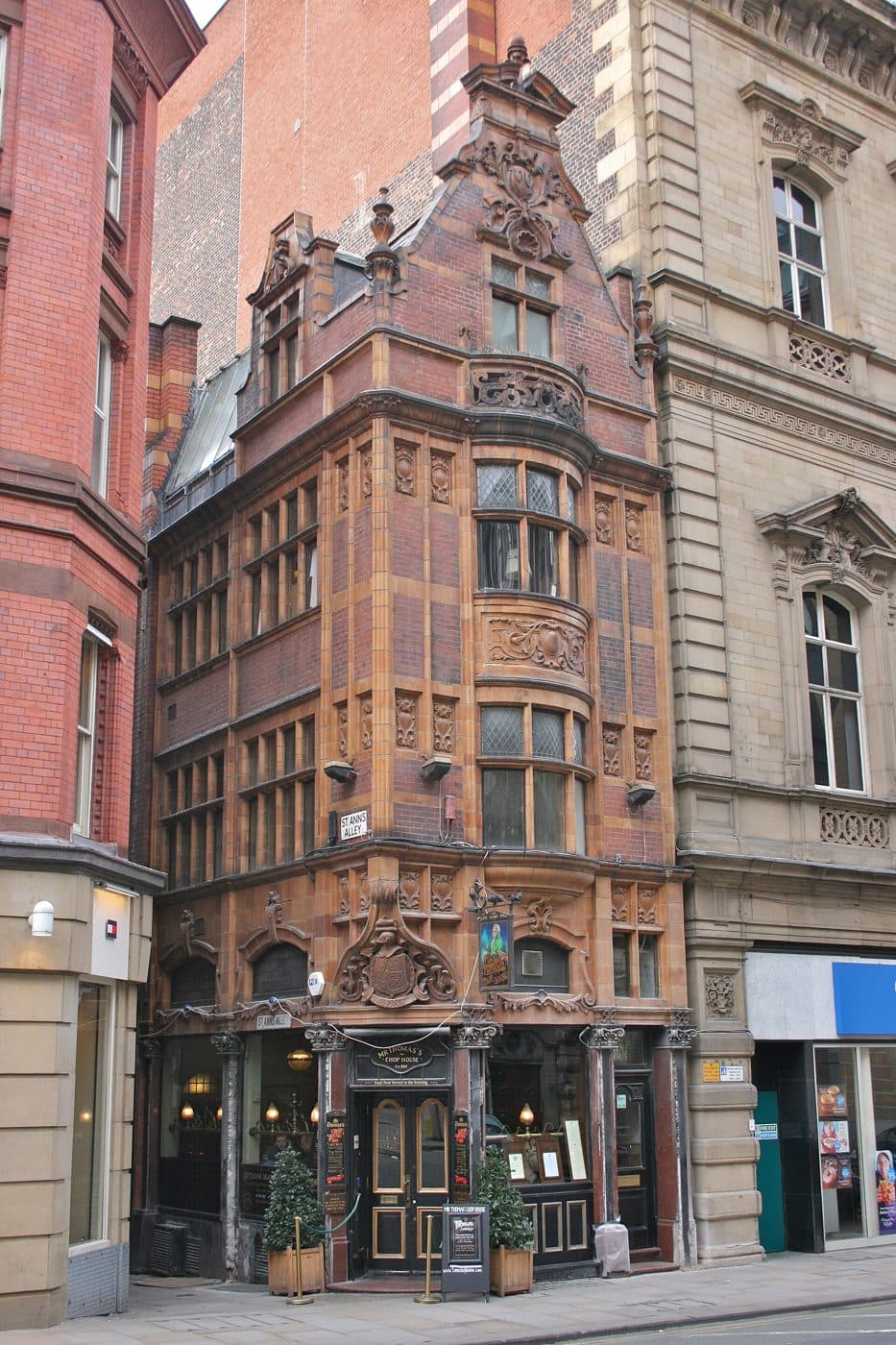 The ornate Victorian terracotta frontage of Mr Thomas's Chop House on Cross Street, Manchester