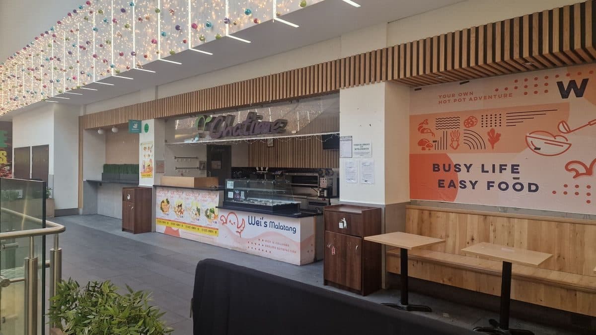 The emptied Chatime unit in Eldon Square with barriers outside