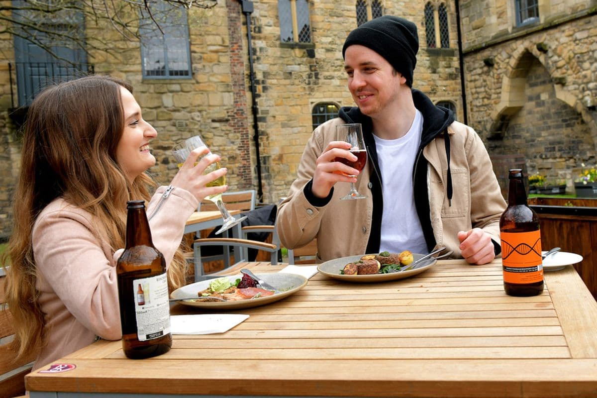 Diners at an outdoor table at Blackfriars Restaurant