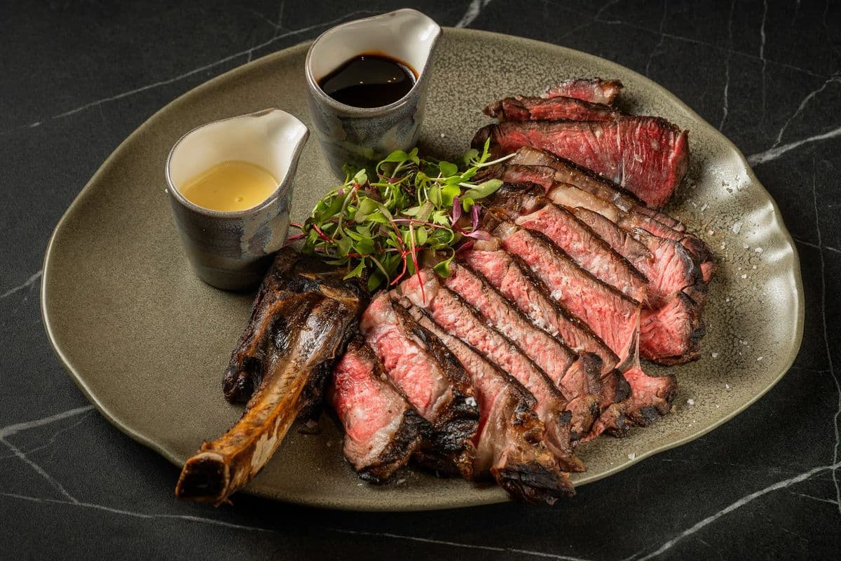 Sliced steak with sides at NIPO, Quayside